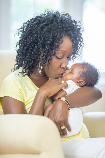 istock Mother and newborn baby 1259356280