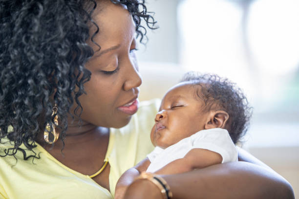 istock Mother and newborn baby 1259356281