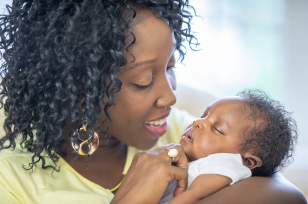 istock Mother and newborn baby 1259356288