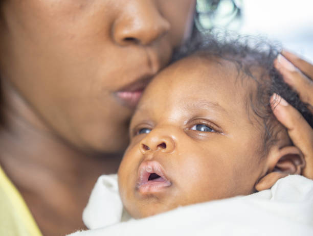 istock Mother and newborn baby 1259356289