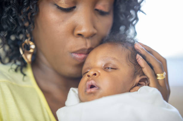 istock Mother and newborn baby 1259356290