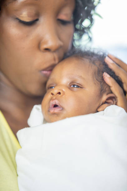istock Mother and newborn baby 1259356293