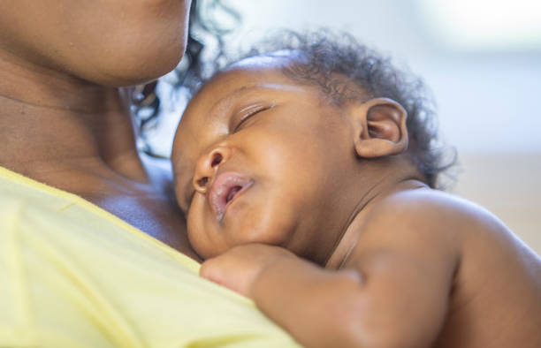 istock Mother and newborn baby 1259356302