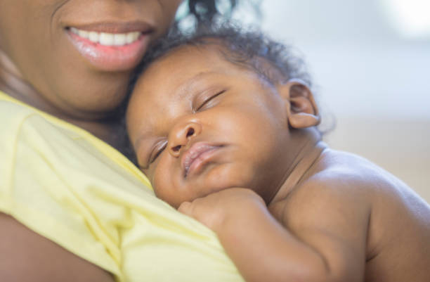 istock Mother and newborn baby 1259356801