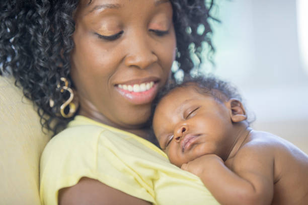 istock Mother and newborn baby 1259356803