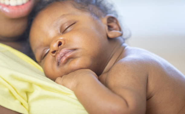 istock Mother and newborn baby 1259356804