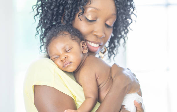 istock Mother and newborn baby 1259356806