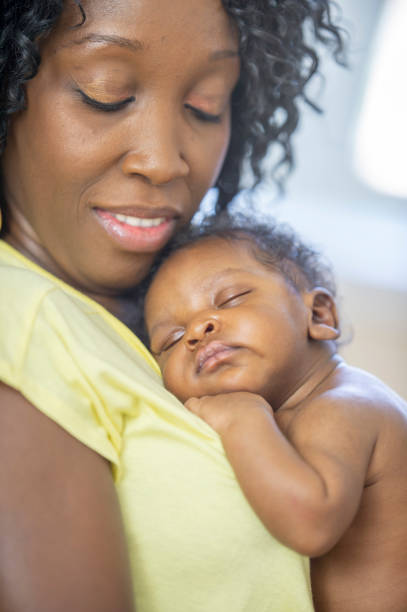 istock Mother and newborn baby 1259356807
