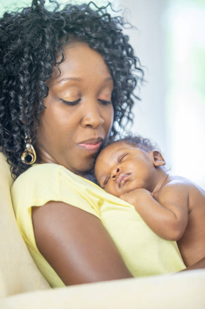 istock Mother and newborn baby 1259356808