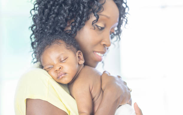 istock Mother and newborn baby 1259356810