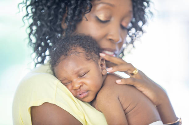 istock Mother and newborn baby 1259356811