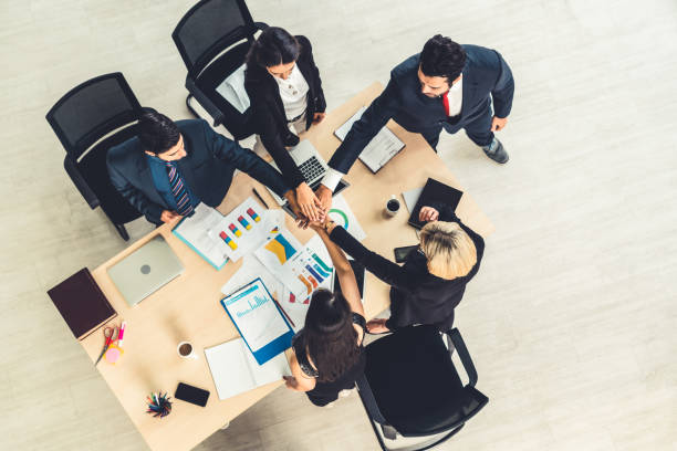 istock Happy business people celebrate teamwork success 1259375837