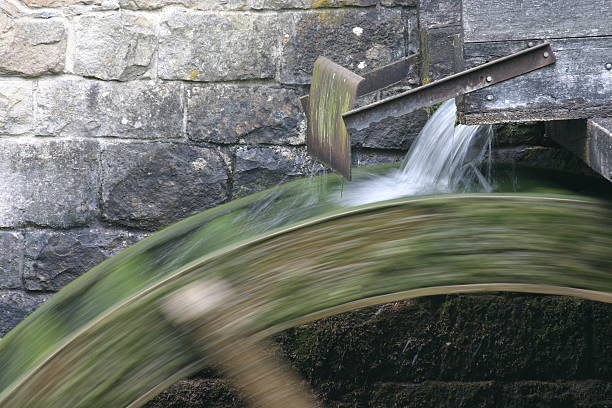 Brilon-Alme. Germany. NorthRhine-Westphalia. Sauerland Region. More than 100 sources has the litte river Alme in the Sauerland Region. Nearby the sources there turns this old Mill wheel.