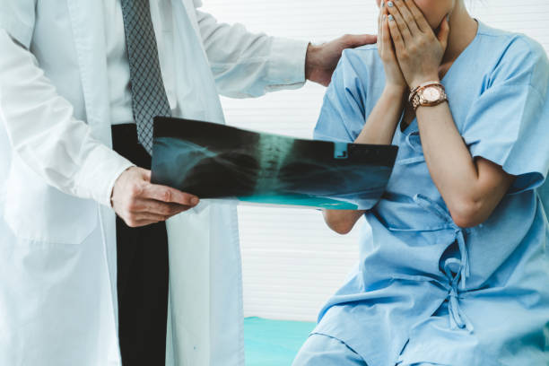 Doctor and unhappy patient at hospital or medical clinic Doctor and unhappy patient at hospital or medical clinic . Healthcare medical malpractice and failure concept. Medical Negligence stock pictures, royalty-free photos & images