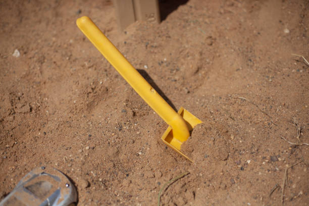 istock Children's shovel in the sandbox. 1259480717