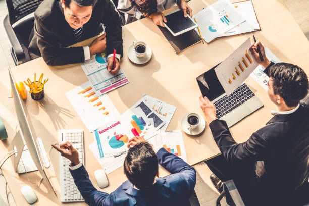 istock Business people group meeting shot from top view 1259536584