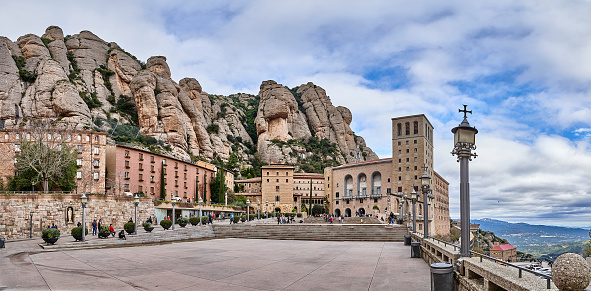 Panoramic view of Montserrat monastery and the geology formations in the mountains, Barcelona, Spain