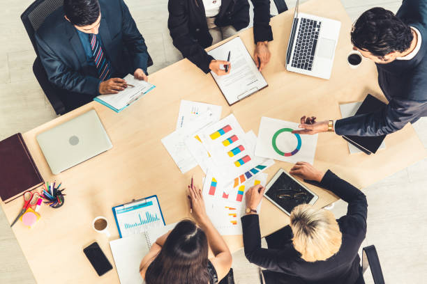istock Business people group meeting shot from top view 1259545404