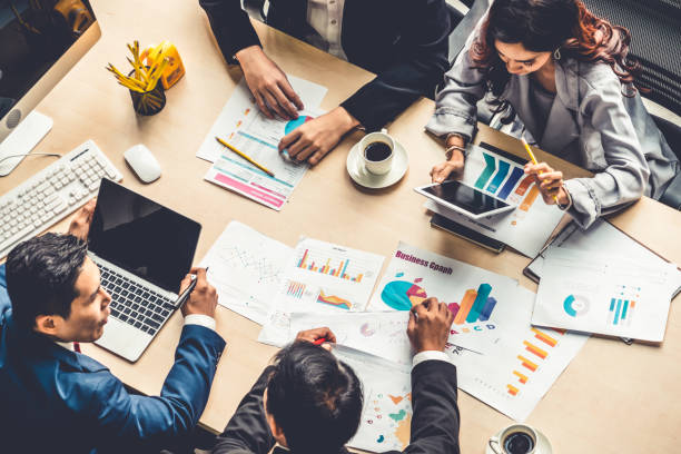 istock Business people group meeting shot from top view 1259545945