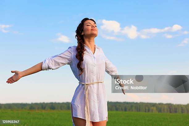 Young Happy Woman In Green Field Stock Photo - Download Image Now - Activity, Adult, Agricultural Field