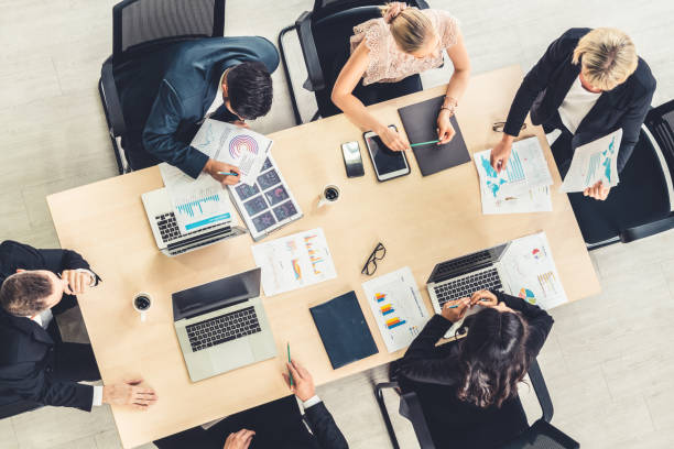 istock Business people group meeting shot from top view 1259561236