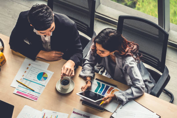 istock Business people group meeting shot from top view 1259570521