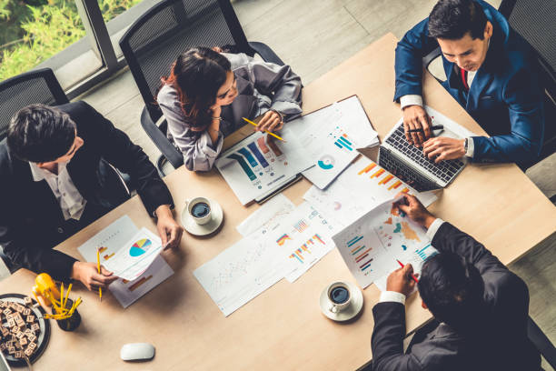 istock Business people group meeting shot from top view 1259575120