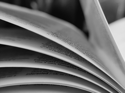 Macro photography of turning pages of a book