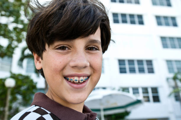 istock Little boy showing his braces 125961259