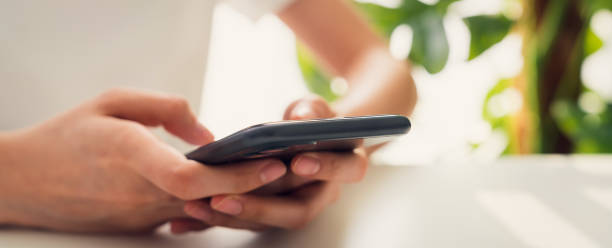 istock Woman using smartphone, During leisure time. The concept of using the phone is essential in everyday life. 1259615913