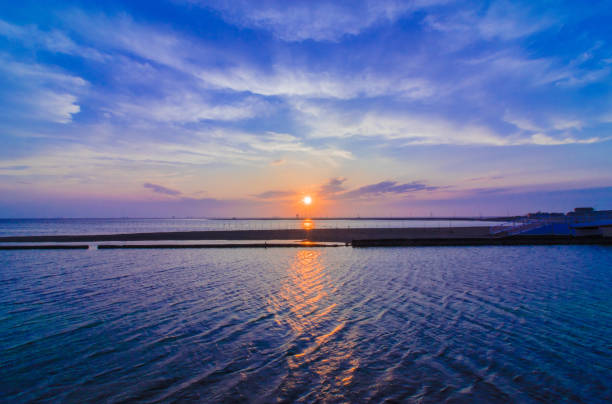 istock Amazing sunset on the shore 1259620008