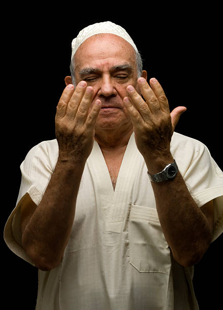 istock Senior muslim man praying 125962398