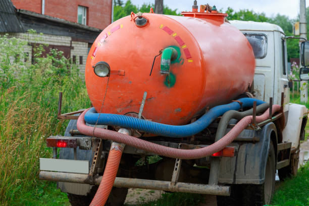 istock A Sewage truck working in village environment 1259687476