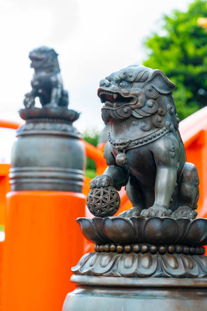 istock Lion wiht paw on globe in Chi Lin Nunnery 1259697912
