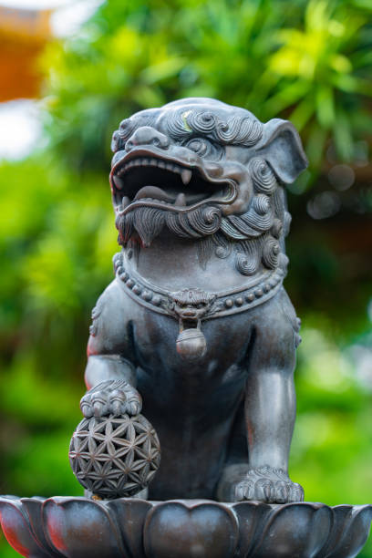 istock Lion wiht paw on globe in Chi Lin Nunnery 1259697918