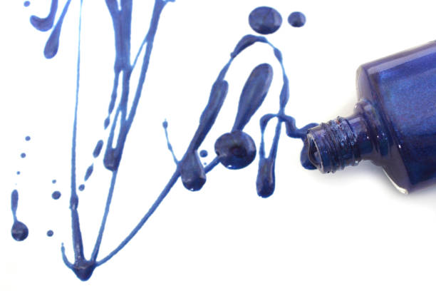 istock Spilled Blue Nail polish on White 1259725781