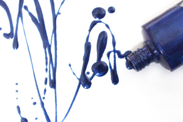 istock Spilled Blue Nail polish on White 1259725794