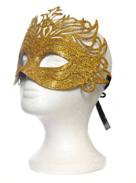 istock Gold Carnival Mardi Gras Mask on Mannequin 1259729522