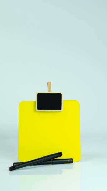 istock A to do checklist with  a wooden clip and mini black board 1259732241