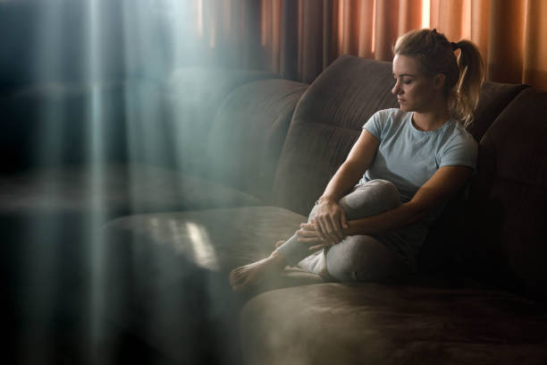 istock Pensive woman feeling sad at home. 1259741746