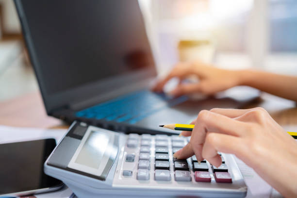 istock Woman accountant 1259771125