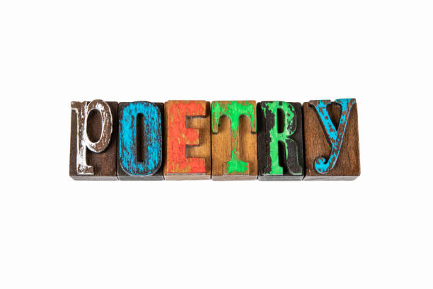 istock POETRY.  Colored wooden letters on a white background 1259774070