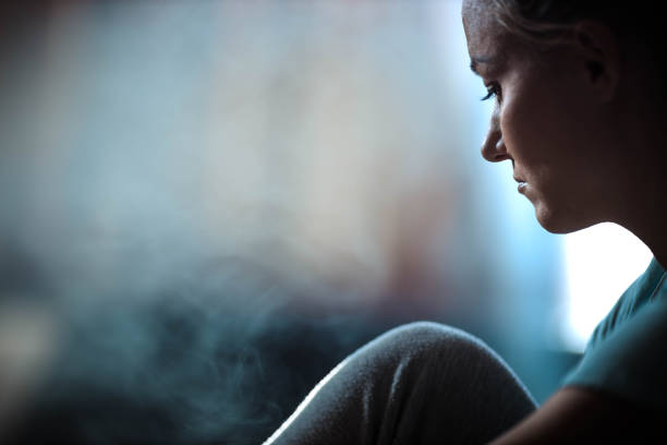 Pensive woman feeling sad at home isolation. Copy space.