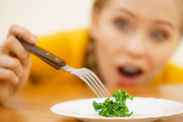 istock Shocked young woman being on diet 1259791020
