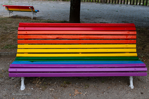 Park bench in Betanzos coas cores de LGBT, Galicia, Spain