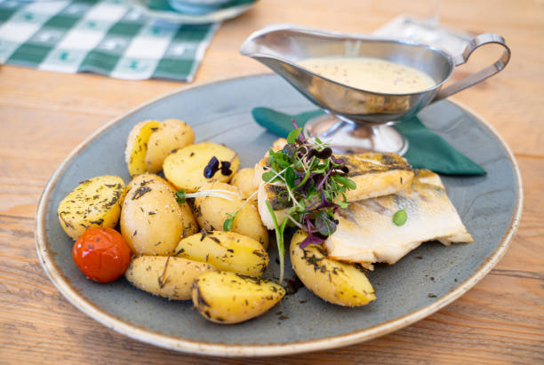 istock potatoe with fish and mustard sauce 1259818286