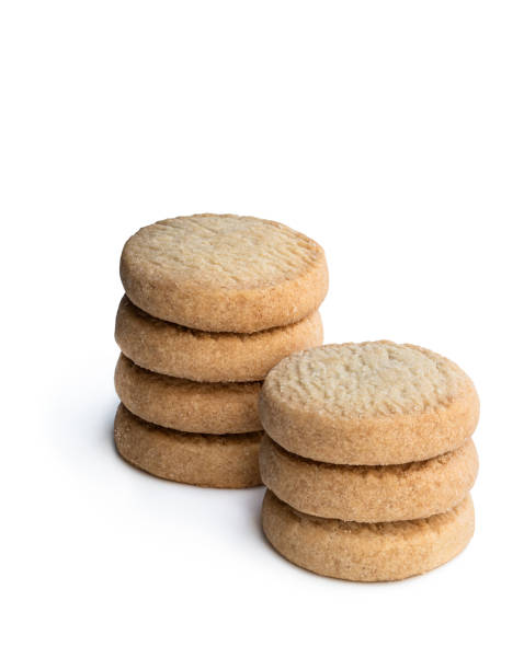 istock Stacked short pastry cookies isolated on white 1259841402