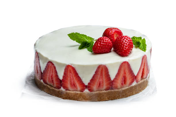 istock Cold cheesecake with strawberry isolated on white 1259843513