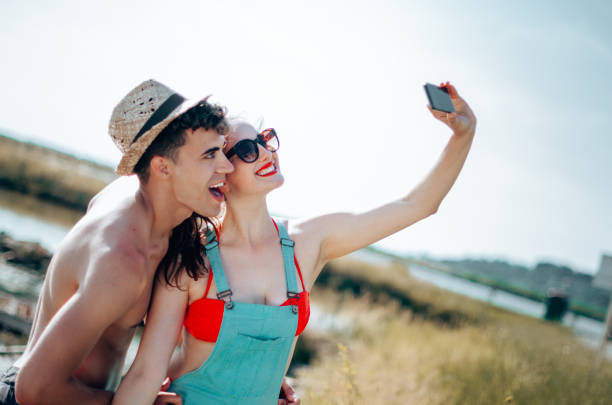 istock happiness couple piggyback together 1259869764
