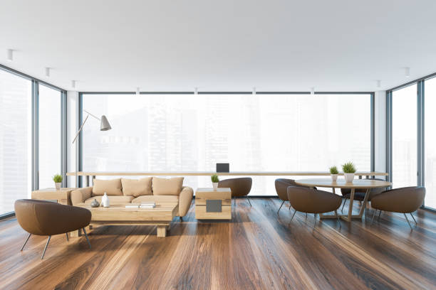 istock Panoramic white living room with brown armchairs 1259889669